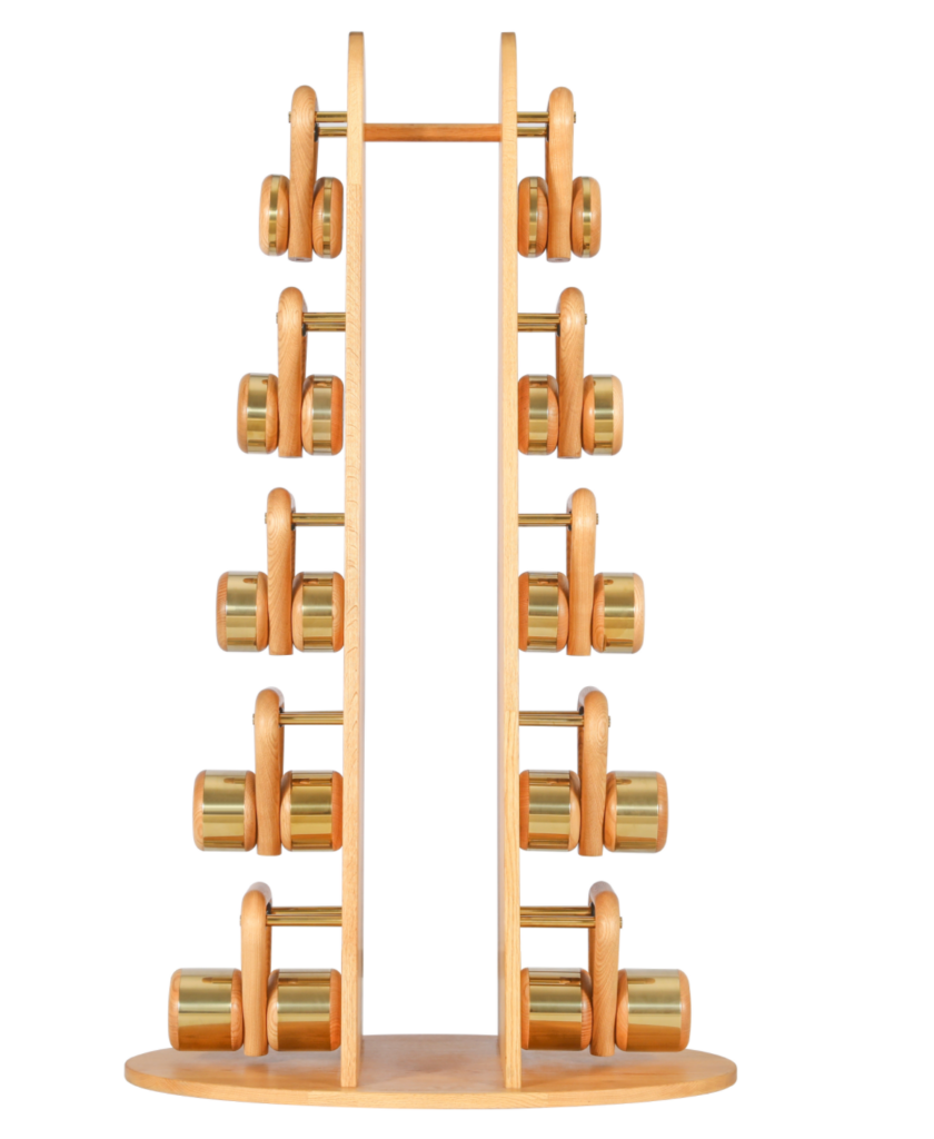 Vertical kettlebell stand in light hardwood with a full set of hand-turned wooden kettlebells
