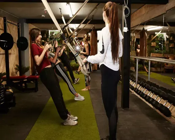 Private home gym with reclaimed timber walls, London — the kind of room the Ice Bath is designed for